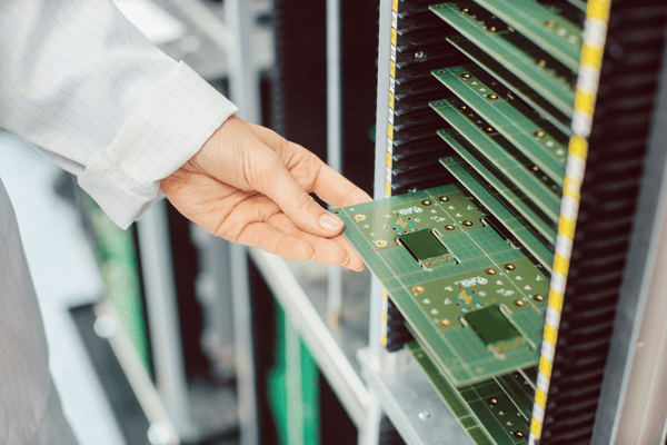 Hybrid PCB build with HDI outer layer pairs over a conventional multilayer core